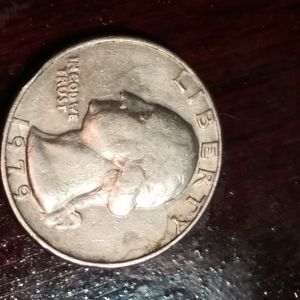 1979 quarter with a face on the leaf reverse make